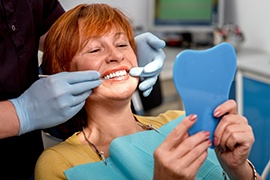 woman smiling during checkup 