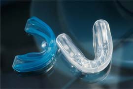 Close up of blue and clear mouthguards