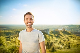 man smiling outside