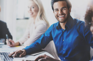 Man smiling at work