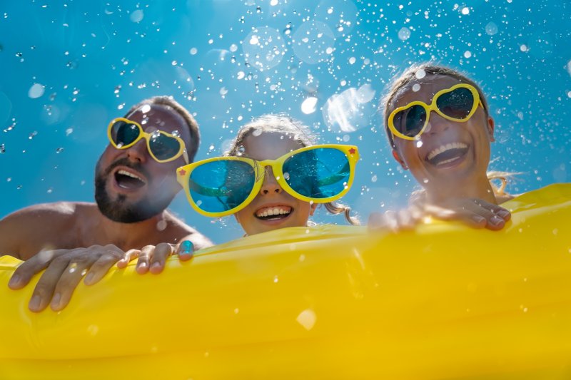 Family smiling on summer vacation 