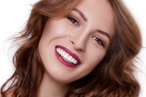 Woman with a beautiful smile from cosmetic dentist in Corpus Christi. 