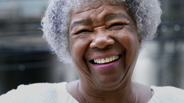person with dental implants smiling