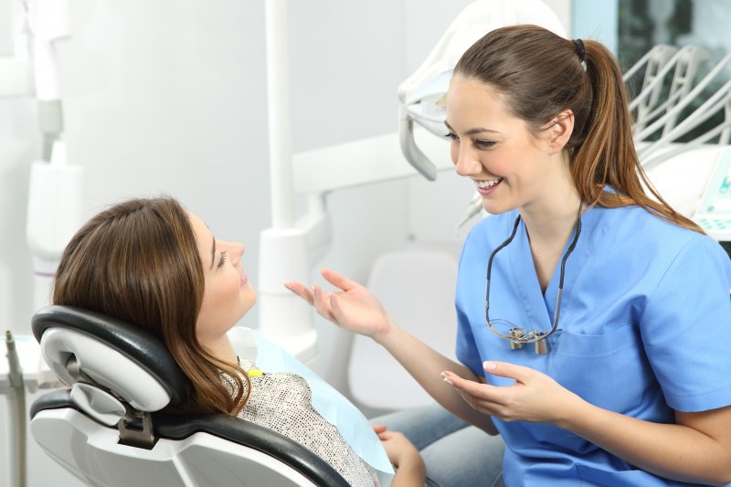 dentist helping patient about to travel for holidays 